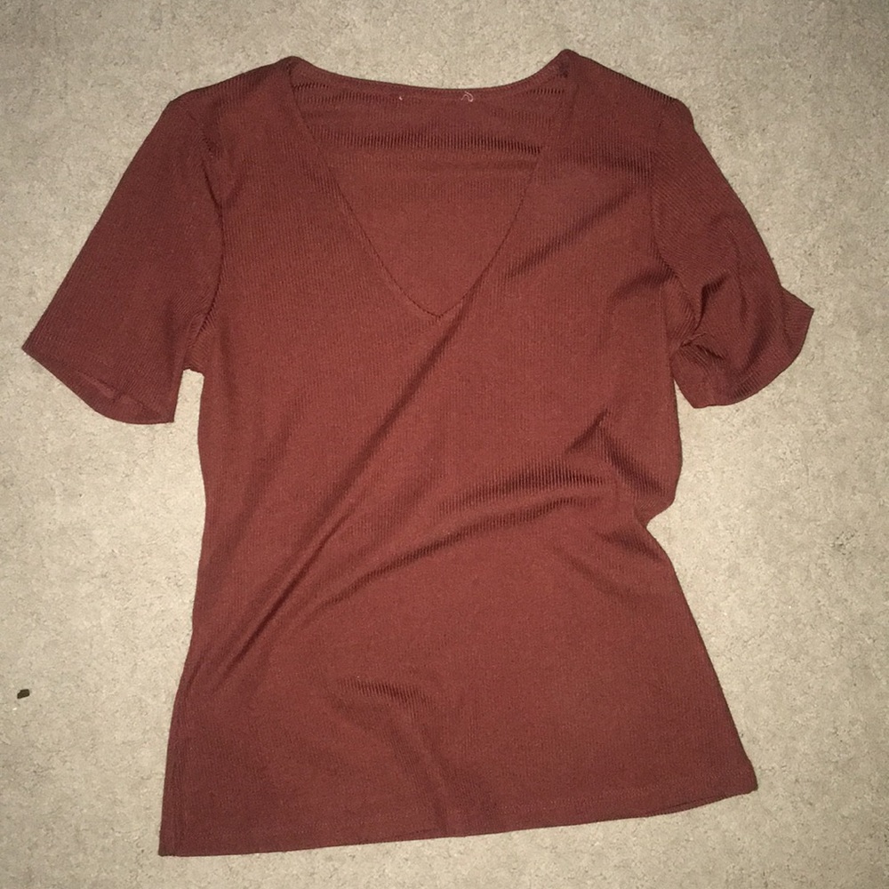 burnt orange short sleeved shirt